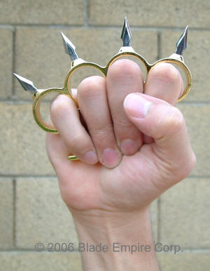 http://www.weapons-universe.com/Brass_Knuckles/Spear_Spikes_Brass_Knuckles-Medium-Gold-Fist.jpg